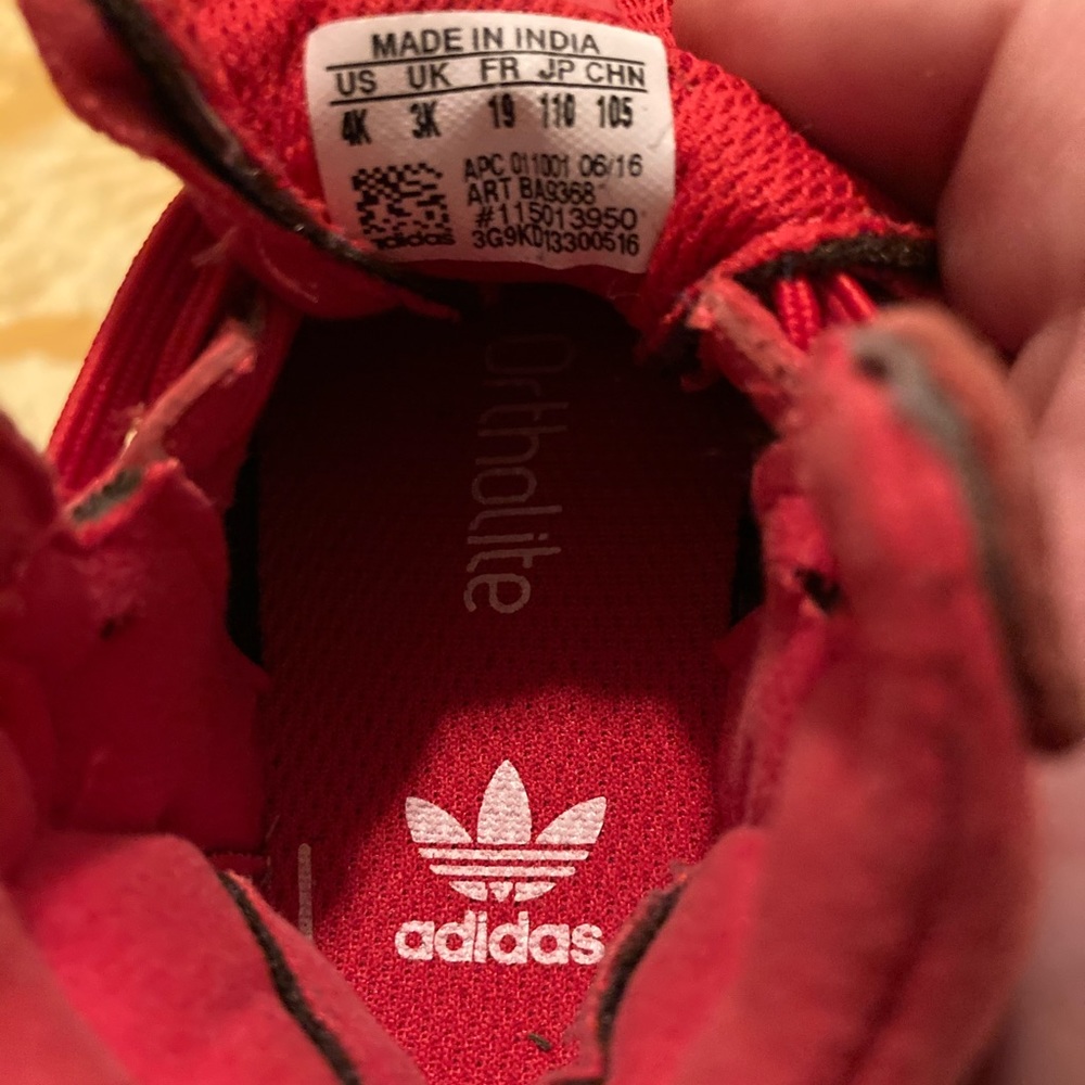 Red adidas shoes